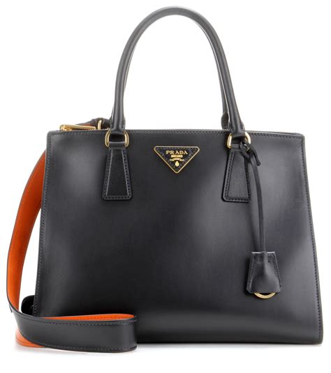 prada m506|Black Large Leather Tote Bag With Zipper Closure.